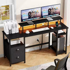 Bureau d'ordinateur noir avec station de charge, bureau de jeu réversible, lumières LED